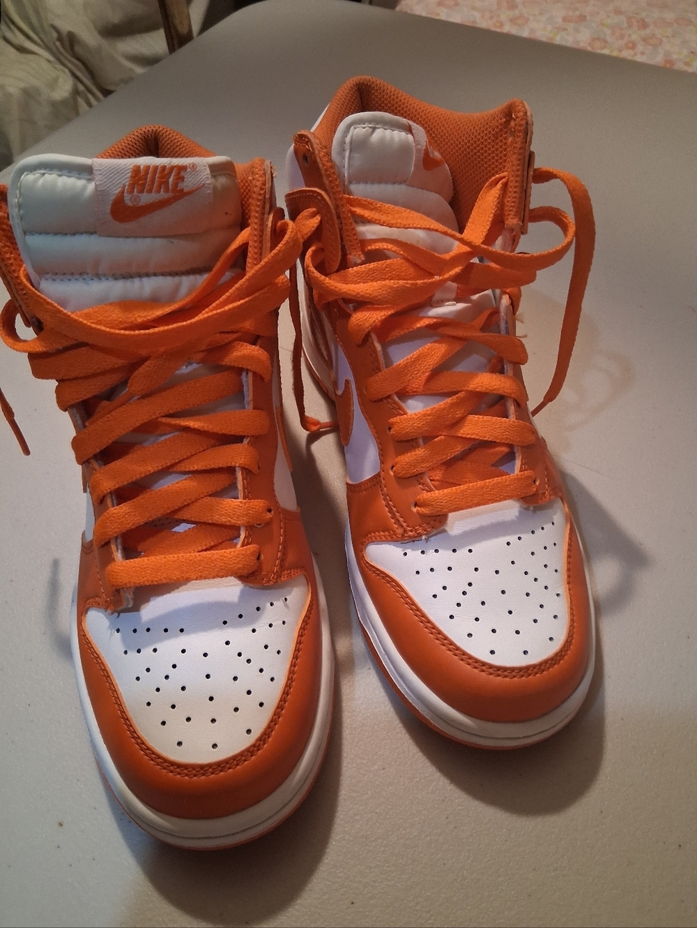 Nike Orange & White High-Top Sneakers (Bold Orange Accents)